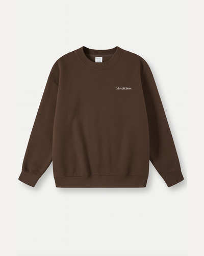Flat lay del Essential Pullover en espresso, cuello redondo y corte oversized Muv&Glow
