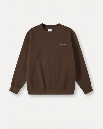 Flat lay del Essential Pullover en espresso, cuello redondo y corte oversized Muv&Glow
