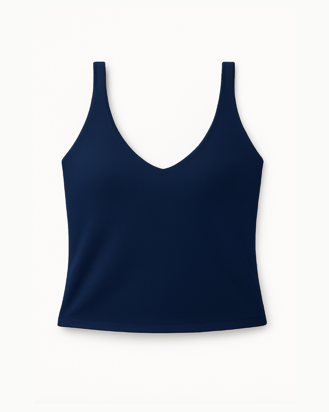 Vista flat lay del top deportivo The Core Twist Top navy de Muv&Glow