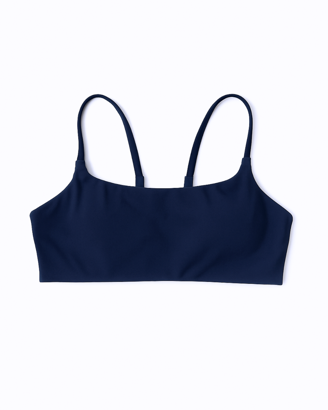 Flat lay del Core Bra azul marino con tirantes finos y corte limpio